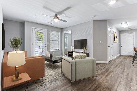 a living room with a couch and a chair